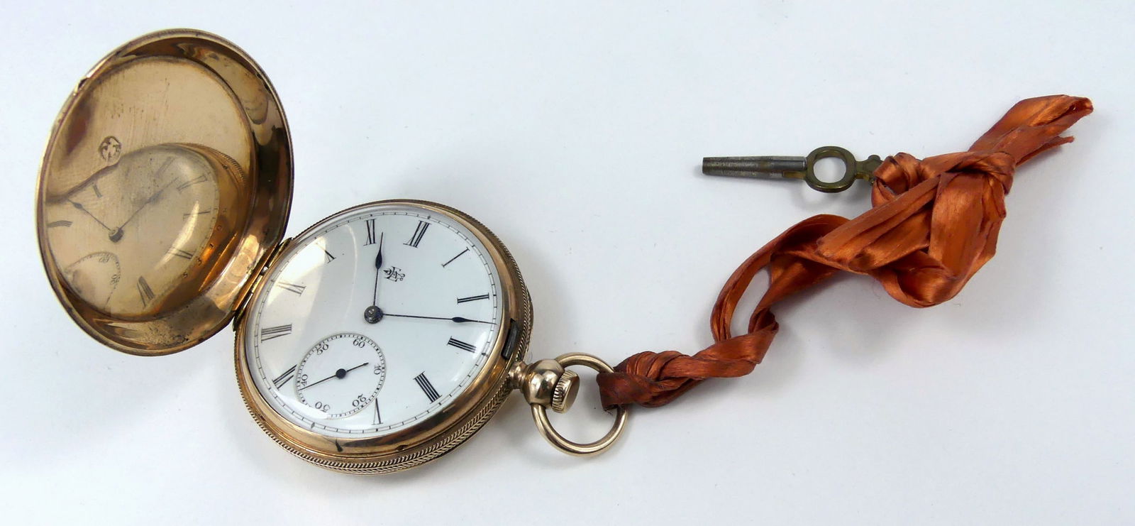 ANTIQUE ELGIN / GAIL BORDEN 10kt YG POCKET WATCH: Antique Elgin / Gail Borden 10kt yellow gold pocket watch. Grade 22, Model 4, 11 jewels. Key included. Measures 2 1/4" x 1 5/8".
