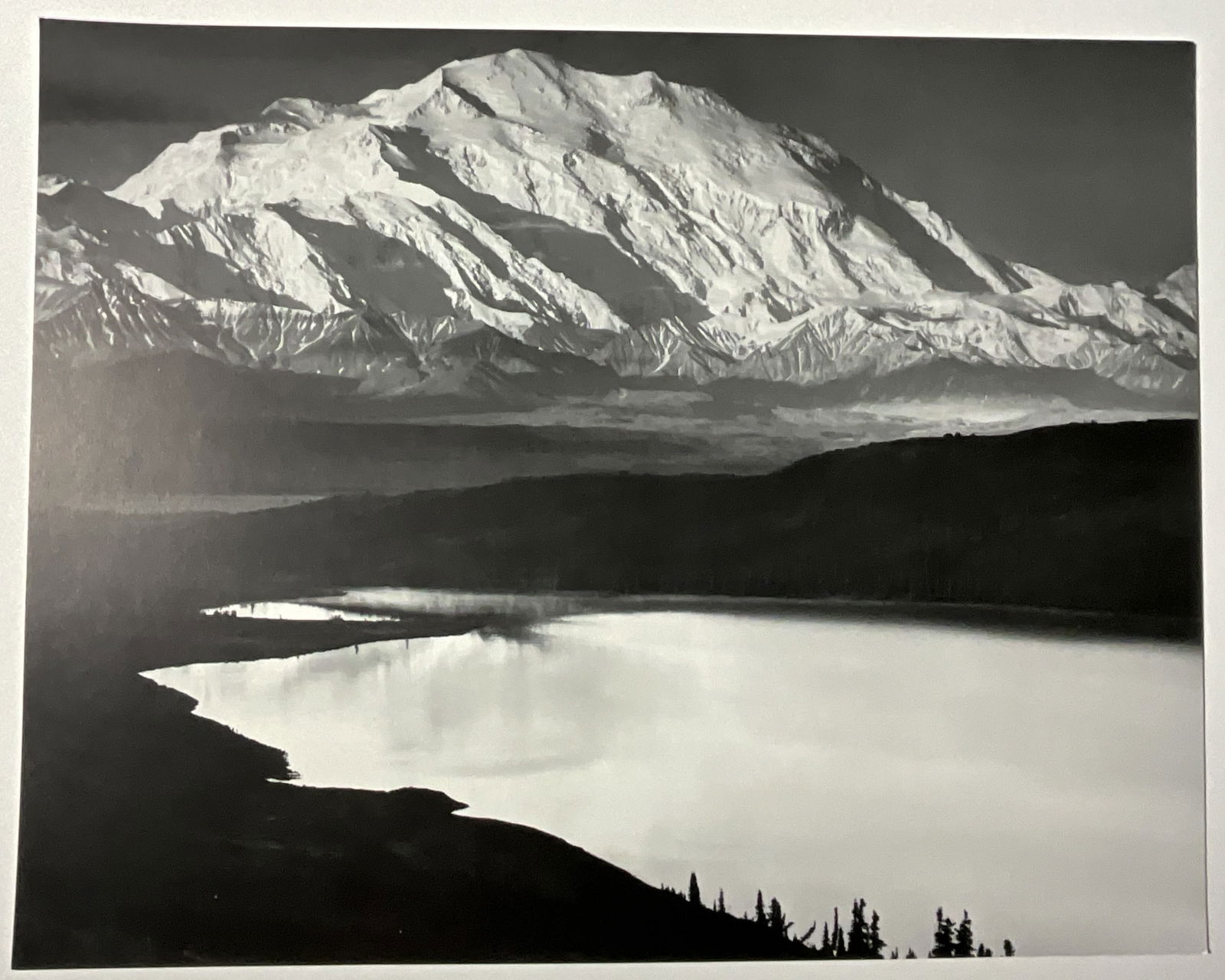 MOUNT MCKINLEY AND WONDER LAKE' PHOTO-LITHO: Ansel Adams (American, 1902-1984) 'Mount Mckliney and Wonder Lake' photo-litho. Mounted. Measures 11 1/2 x 14 1/2 inches.