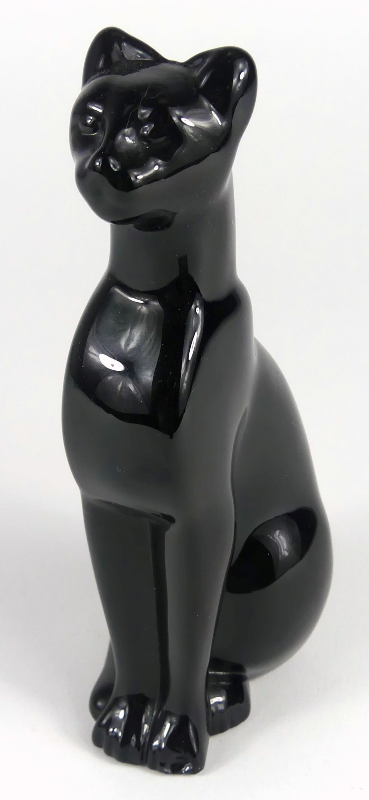 BACCARAT BLACK CRYSTAL 'EGYPTIAN CAT' FIGURINE: Baccarat black crystal figure of an Egyptian Cat. Marked to underside. Measures 6 1/4" x 3" x 2". Note: chip to foot.
