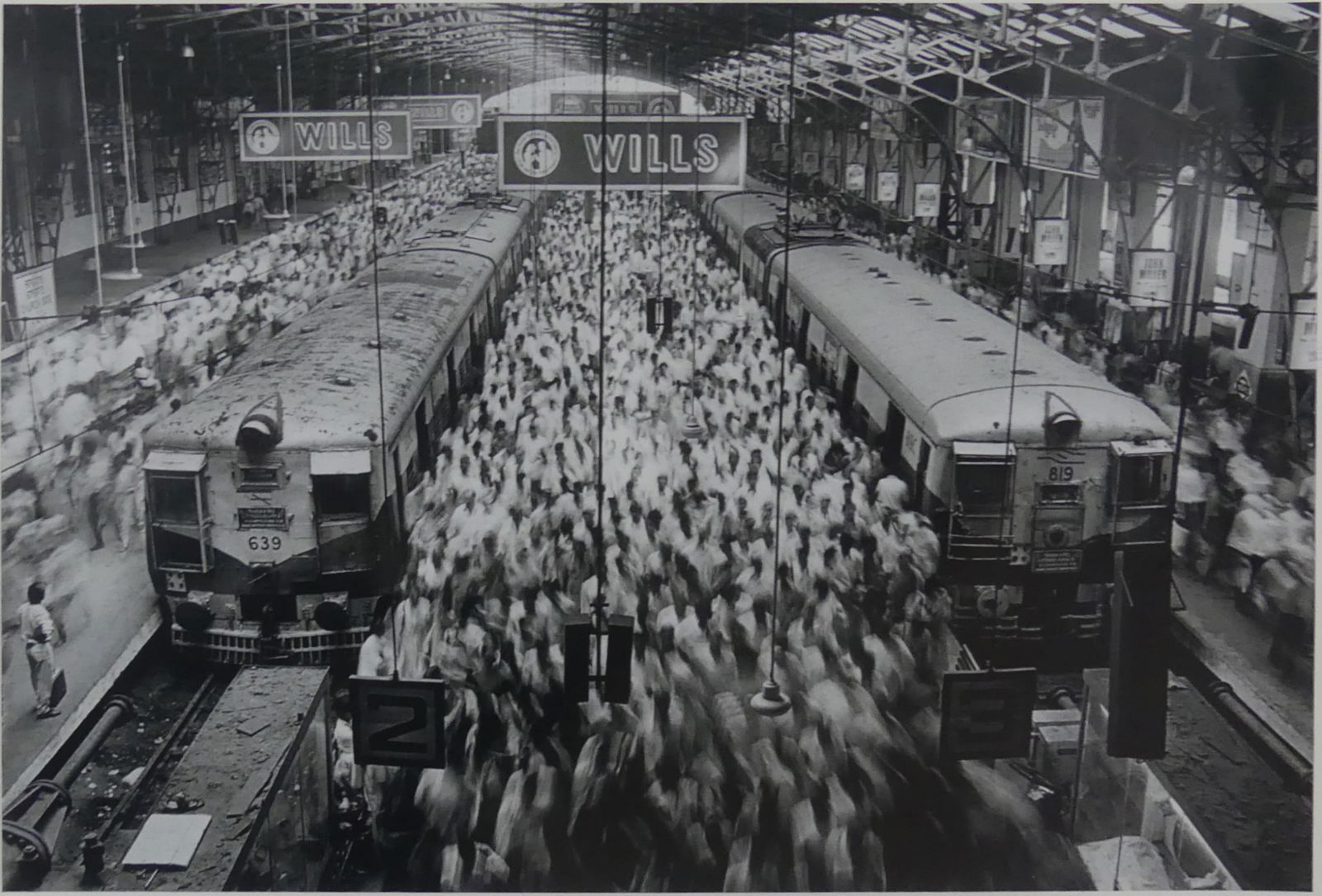 SEBASTIAO SALGADO 'CHURCHGATE STATION INDIA' PHOTO: Sebastiao Salgado Churchgate Station, Western Railroad Line, Bombay, India photo-litho. Sheet measures 21 3/8" x 14 3/8".
