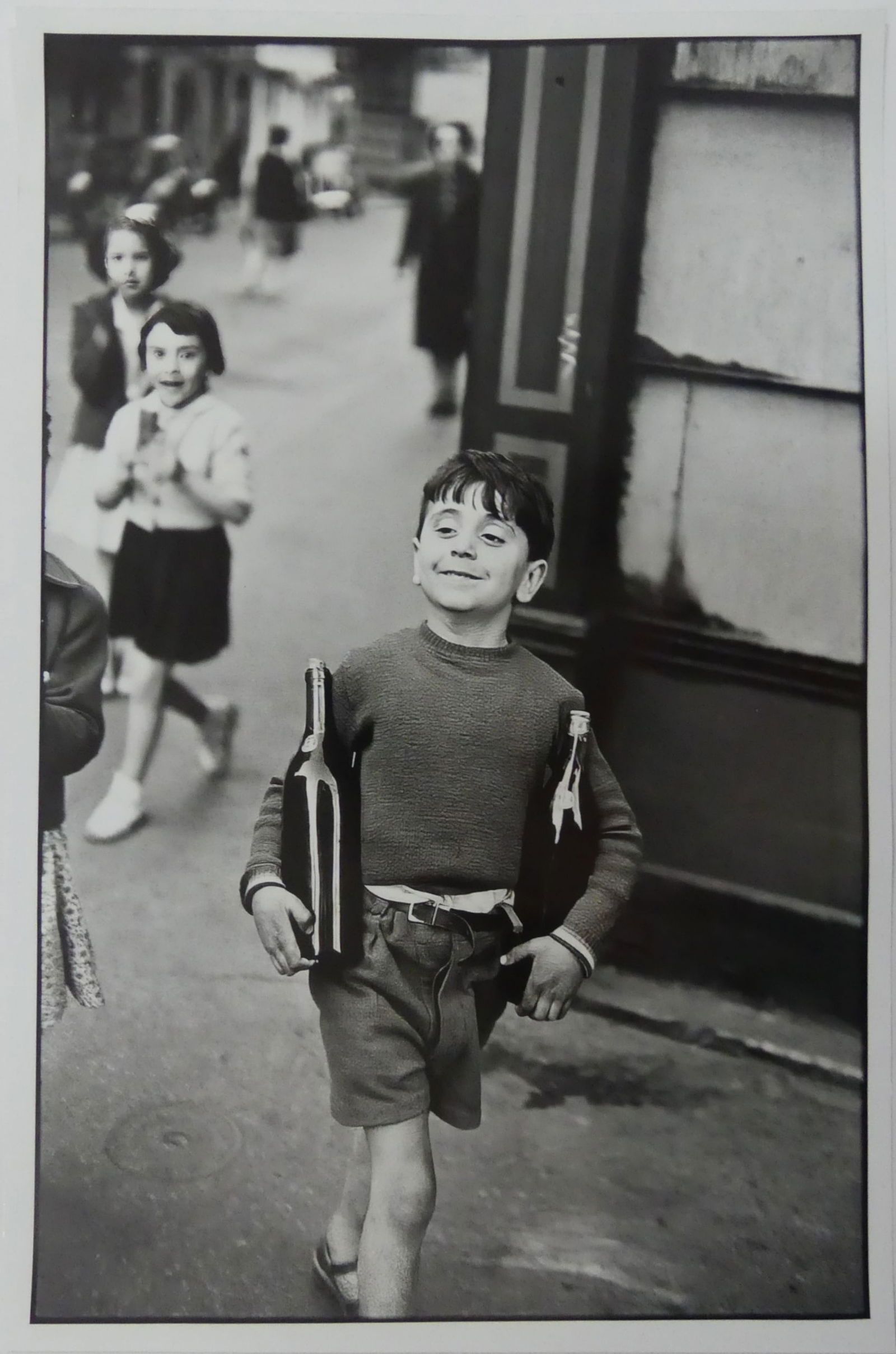 HENRI CARTIER-BRESSON 'RUE MOUFFETARD' PHOTO-LITHO: Henri Cartier-Bresson Rue Mouffetard photo litho. Sheet measures 21" x 14".