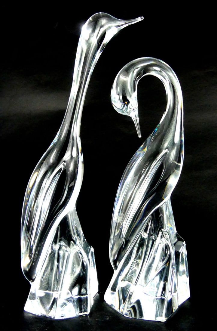 2pc DAUM CRYSTAL HERON BIRD SCULPTURES: Two Daum French crystal art glass bird sculptures. Each signed to side of base. Largest measures 14 1/4" x 6" x 3".