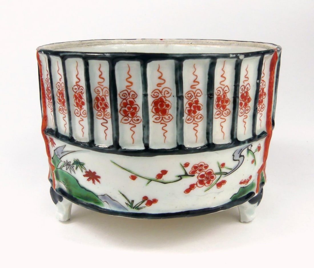 JAPANESE ARITA PORCELAIN TRIPOD CENSER: Japanese Arita porcelain censer with tripod feed. Measures 5" x 5" x 3 1/2".