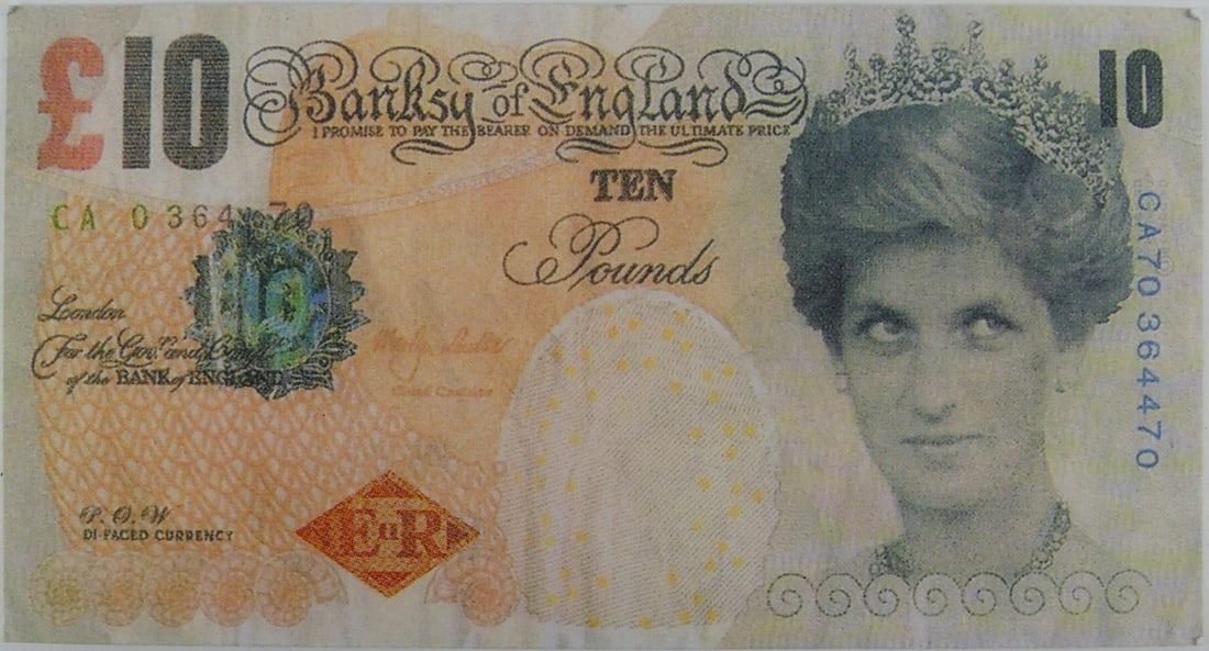 BANKSY 'DI-FACED' TENNER OFFSET LITHOGRAPH: Banksy 'Di-faced Tenner' offset lithograph on paper depicting a 10 GBP note having the face of Princess Diana instead of the Queen. Measures 5 5/8" x 3".