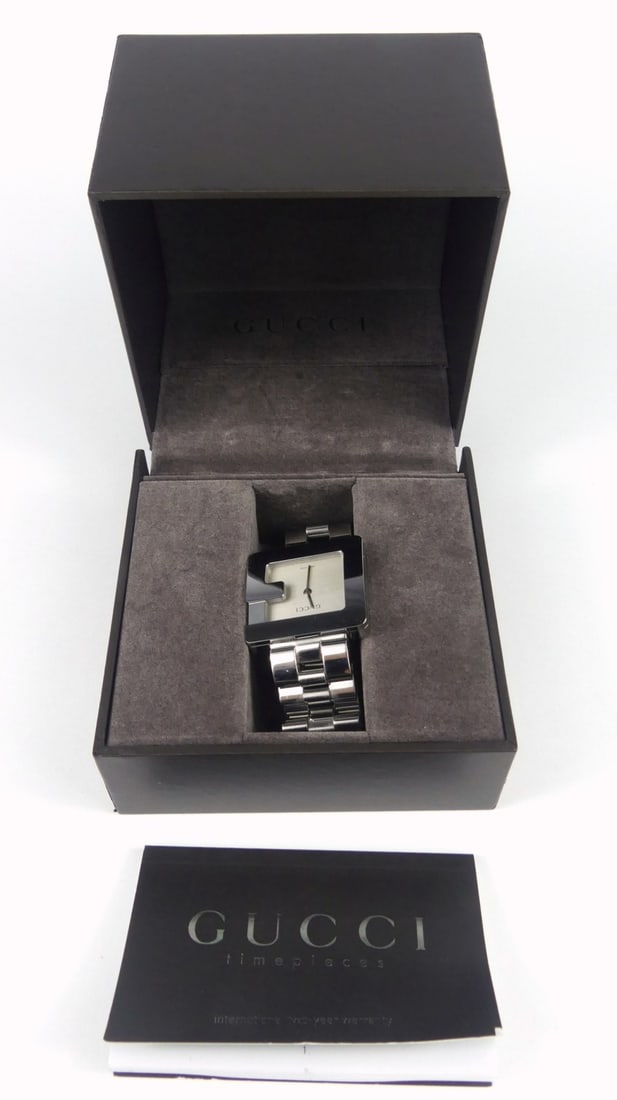 GUCCI MEN'S STAINLESS G WRISTWATCH: Gucci Men's 'G' stainless steel wrist watch #3600M. Quartz. Includes original box, papers and extra links. Case measures 32mm x 30mm.