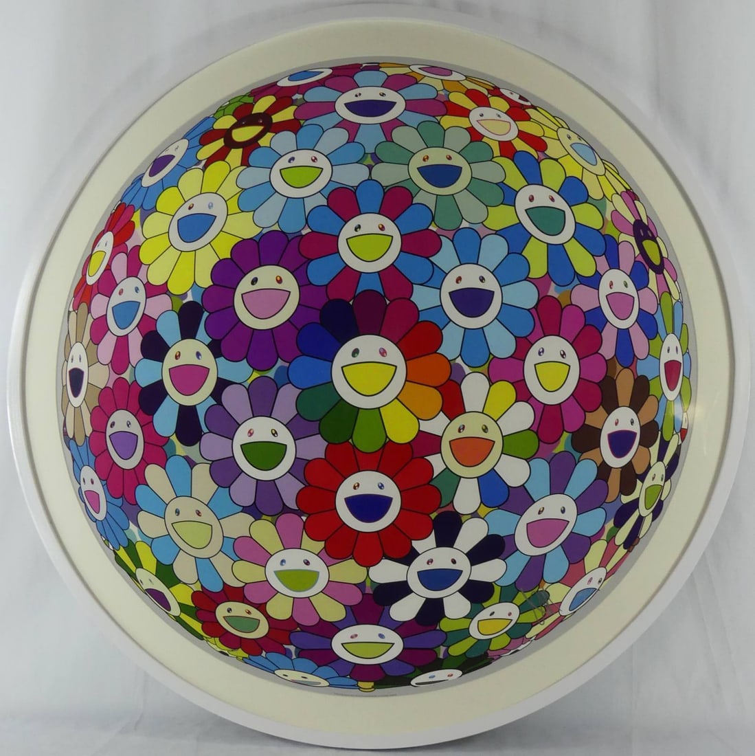 TAKASHI MURAKAMI FLOWERBALL CHARGE INTO THE CENTER: Takashi Murakami (Japanse, b. 1962) 'Flowerball: Charge into the Center of Consciousness' 3-D offset lithograph in colors. Signed and dated 205/300 lower right. Viewable measures 27 1/2" x 27 1/2". Fr