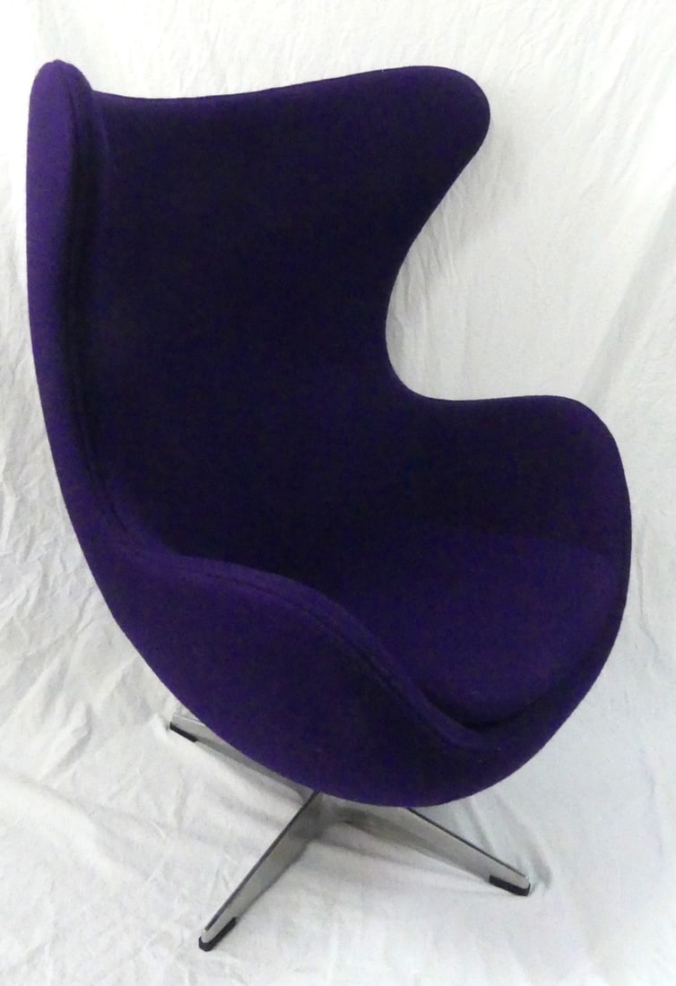 ARNE JACOBSEN STYLE EGG CHAIR: Arne Jacobsen style 'Egg' lounge chair upholstered in purple fabric. Includes removable cushion. Measures 43 1/2" height x 34" width x 30" depth.