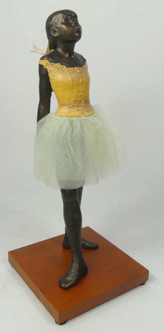 EDGAR DEGAS 'LITTLE BALLERINA' SCULPTURE: Little Ballerina composite sculpture after Edgar Degas. Mounted to wooden base and marked to underside. Measures 14" height.