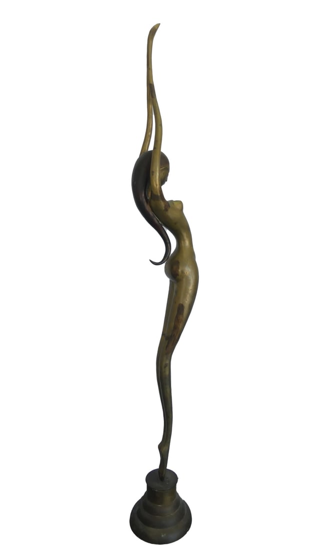 KARL HAGENAUER STYLE MID CENTURY BRASS SCULPTURE: Large mid-century modernist brass sculpture depicting a female dancer in a standing diver pose. Measures 77 1/4" x 12" x 10".