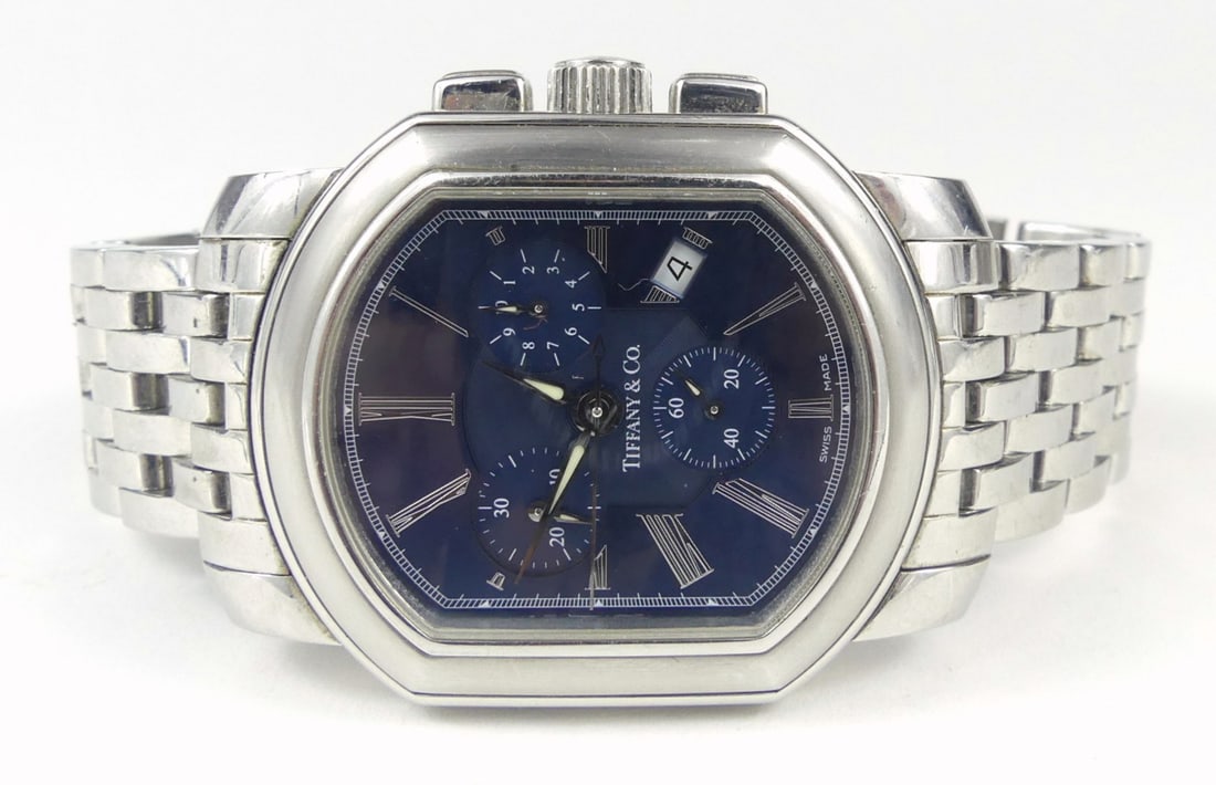 TIFFANY & CO MARK COUPE CHRONOGRAPH WRISTWATCH: Tiffany & Co. Mark Coupe men's Quartz Chronograph, stainless steel, blue dial. Original Tiffany bracelet and crown. Case measures 34mm x 47mm lug to lug.