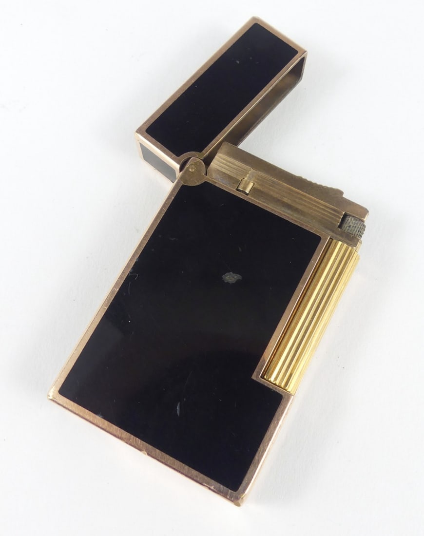 S.T. DUPONT ROSE GOLD CHINESE LACQURED LIGHTER: French St. Dupont 18K rose gold plated with Chinese black lacquer lighter. Marked to underside. Measures 2 3/8" x 1 1/2".