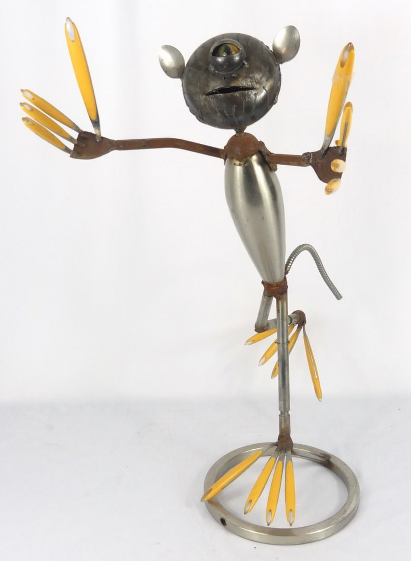 'RUNNING WITH SCISSORS' WELDED METAL SCULPTURE: Unknown artist welded scrap metal sculpture. Titled 'Running with Scissors'. Measures 26" x 22" x 14".