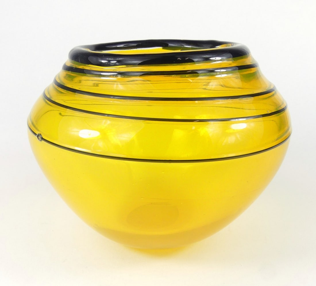 DALE CHIHULY [AFTER] ART GLASS BOWL: Art glass bowl having a black threaded design after Dale Chihuly. Signed to underside. Measures 5 3/4" x 5 1/2" x 5" height.