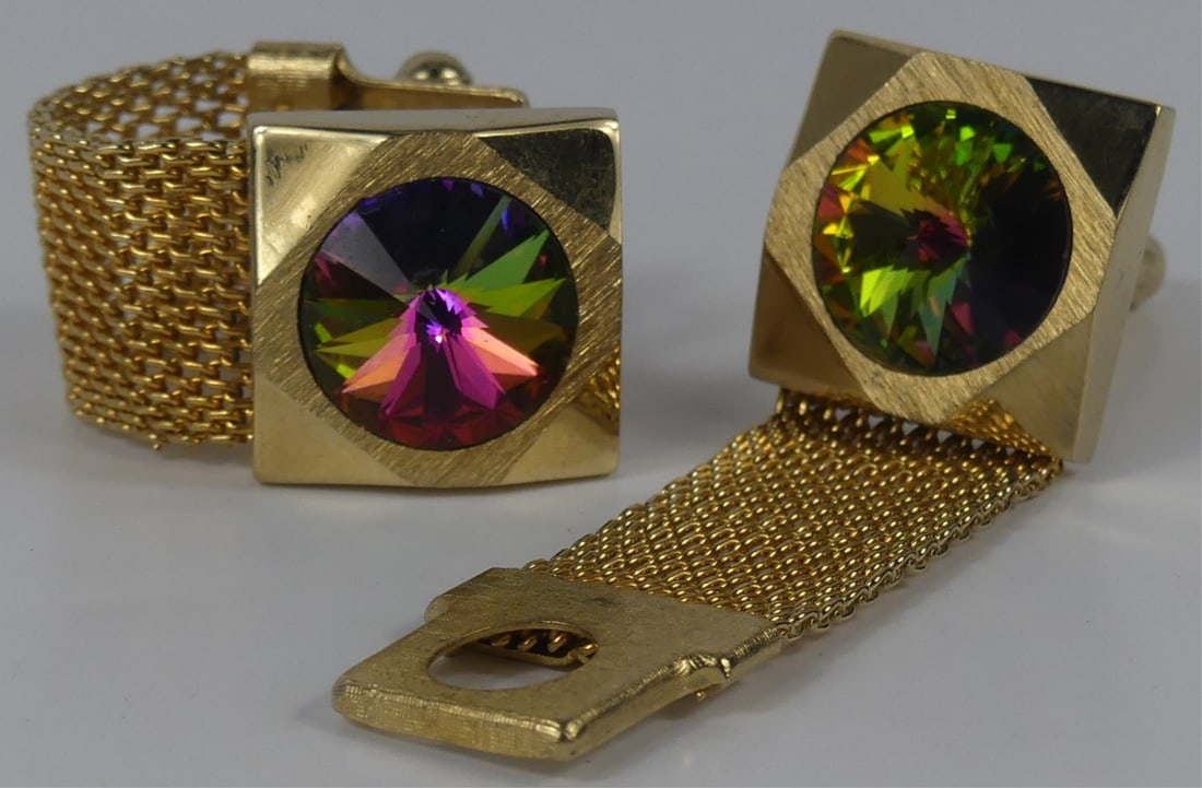 PR ELVIS PRESLEY OWNED RHINESTONE CUFFLINKS: Pair of Elvis Presley owned gold-tone cufflinks with watermelon trivoli rhinestones. Each face measures approx 3/4" x 3/4". Includes hand signed letter from Vernon Presley.
