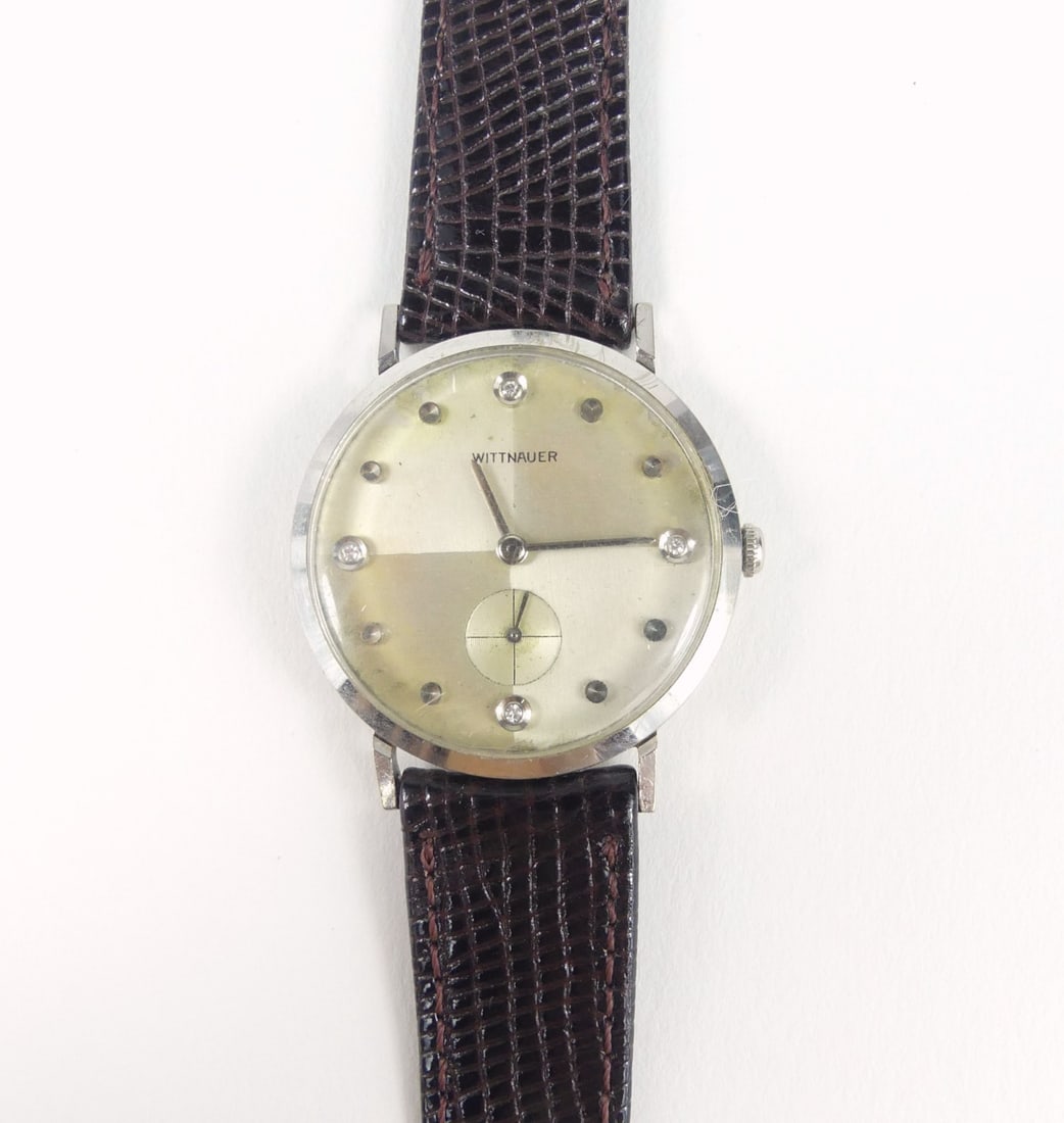 WITTNAUER 10k WHITE GOLD FILLED WRISTWATCH: Wittnauer 10K white gold filled wrist watch. 12j, swiss movement, 76/2 revue, diamond dial. Case measures 32mm width x 37mm lug to lug.