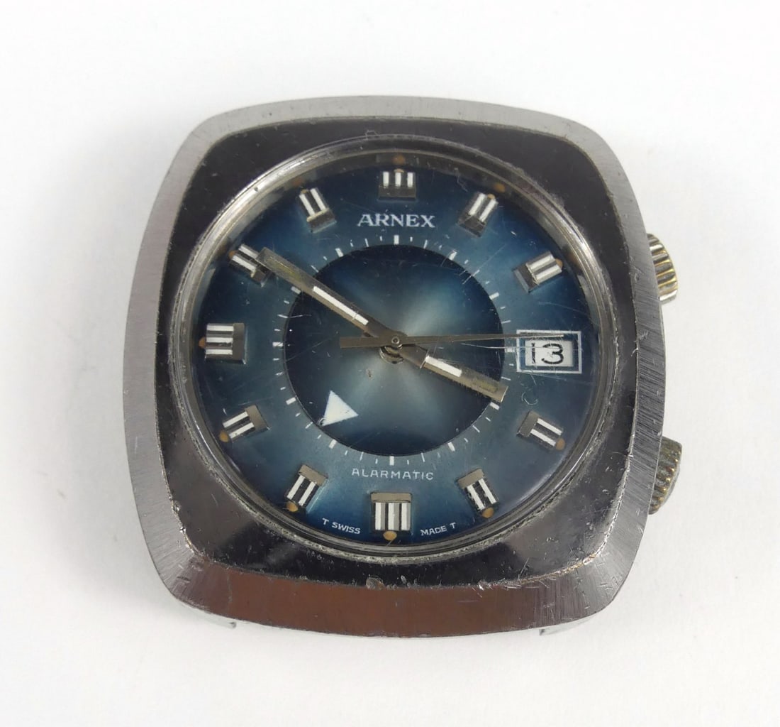 ARNEX ALARMATIC AUTOMATIC ALARM WRISTWATCH: Arnex Alarmatic automatic alarm wrist watch. Stainless steel with blue dial and date window. No band. Case measures 40mm width x 42mm length.