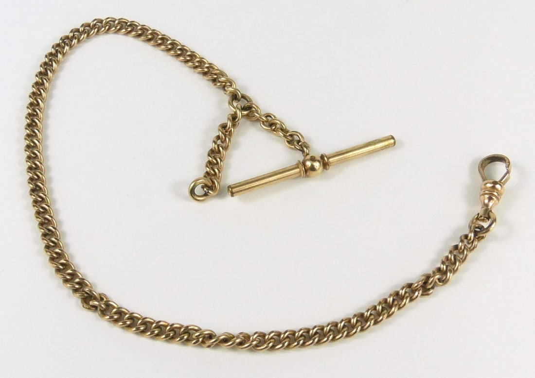 VINTAGE GOLD FILLED POCKET WATCH CHAIN: Vintage gold filled pocket watch chain with small drop chain. Measures 11 1/2" length.