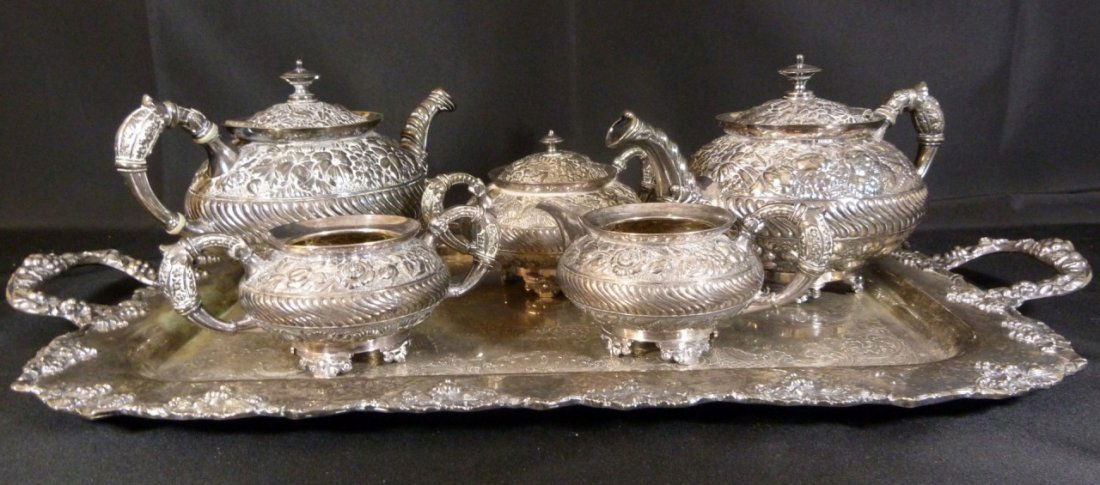 MERIDEN ANTIQUE REPOUSSE SILVERPLATE TEA SET (1 of 9)