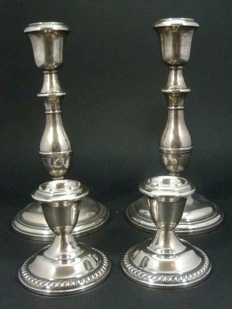 FOUR STERLING SILVER CANDLESTICK HOLDERS (1 of 8)
