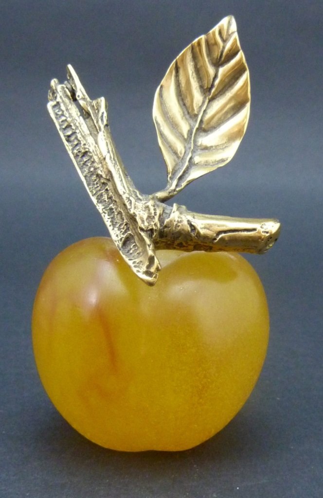 DAUM FRANCE PATE DE VERRE APPLE: Daum France Pate De Verre apple with a golden branch & leaf. Measures 3 1/2" ( 8.89cm) height by 2" ( 5.08cm) width, total weight in box 272.1g.