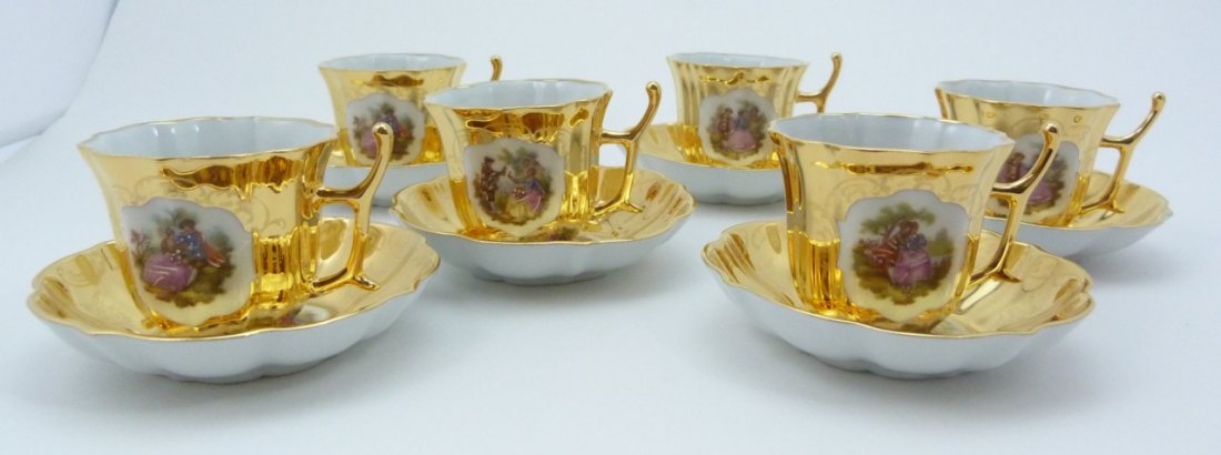 12 LIMOGES FRANCE DEMITASSE CUPS & SAUCERS: Limoges France porcelain Demitasse Cups and Saucers. Cups measure 2" (5.08cm) height & width & saucers measure 3 1/2" (8.89cm) diameter.