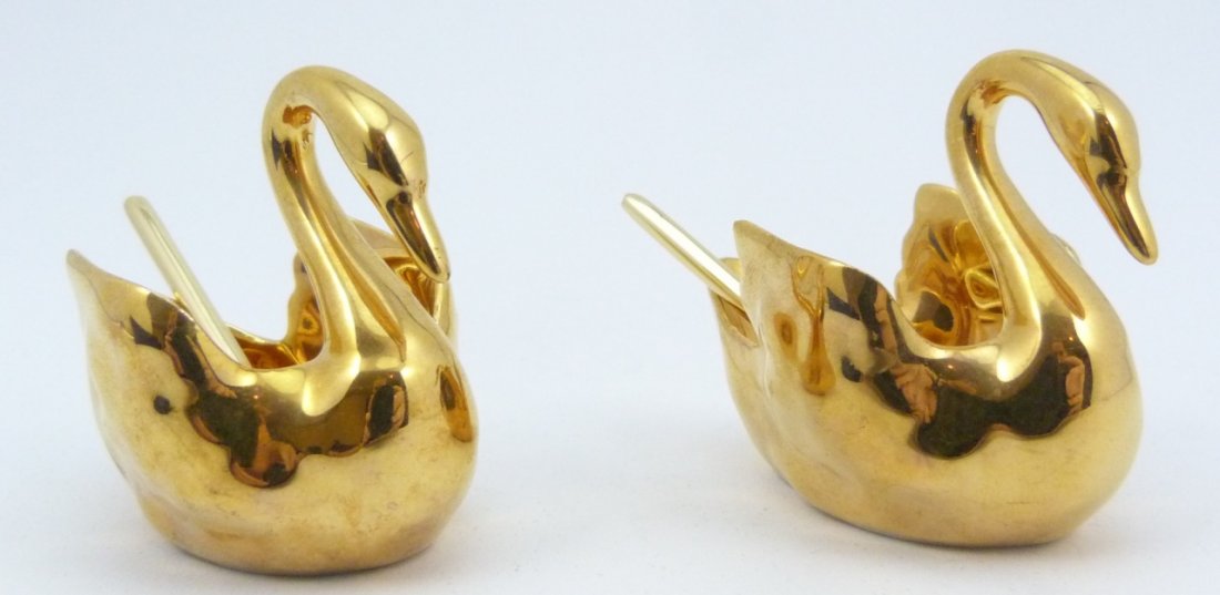 SET OF LIMOGES GOLD PORCELAIN SWAN SALTS: Set of Limoges gold porcelain swan salts. Each measures approx 2 1/4" (5.71cm) height & width, total lot weight 192.7g (including original box).
