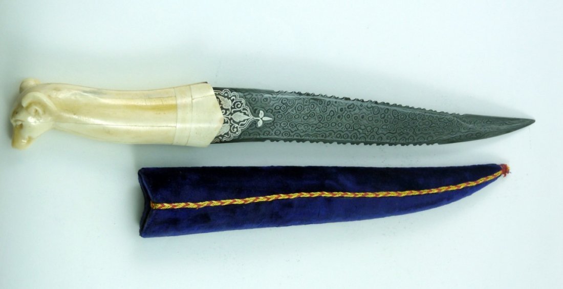 MUGHAL ANIMAL CARVED BONE DAGGER w SHEATH: Mughal animal carved bone dagger with sheath. Measures 12" (30cm) length, total weight 176g.