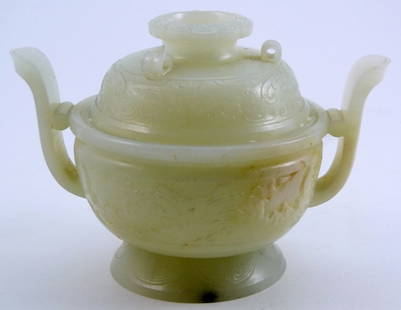 CHINESE CARVED JADE LIDDED CENSER: Chinese carved jade lidded censer with handles. Measures 4" (10cm) height by 6" (15cm) width , total weight 594g.