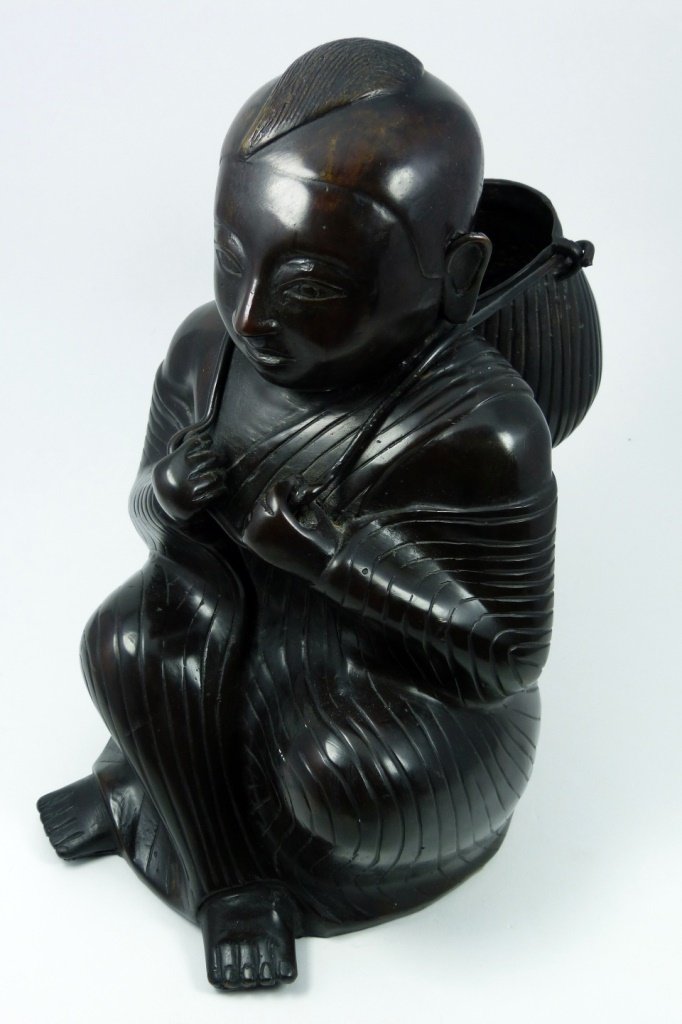 CHINESE ANTIQUE BRONZE OF CHILD w BASKET: Chinese bronze statue of child with basket .Measures 12' (30cm) height by 7" (18cm) width.