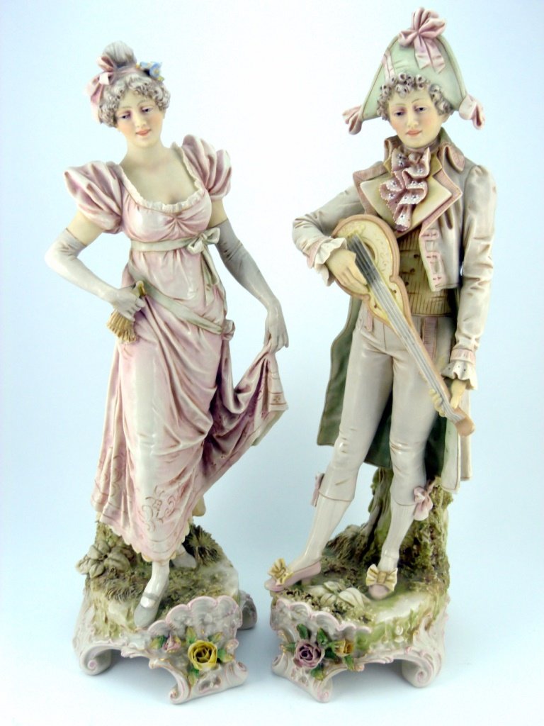 ROYAL DUX BOHEMIA PORCELAIN ORNATE FIGURES: Royal Dux Bohemian antique porcelain fancy figures. Each measure approx 17" (43cm) height by 5" (13cm) width, total weight 3525g.