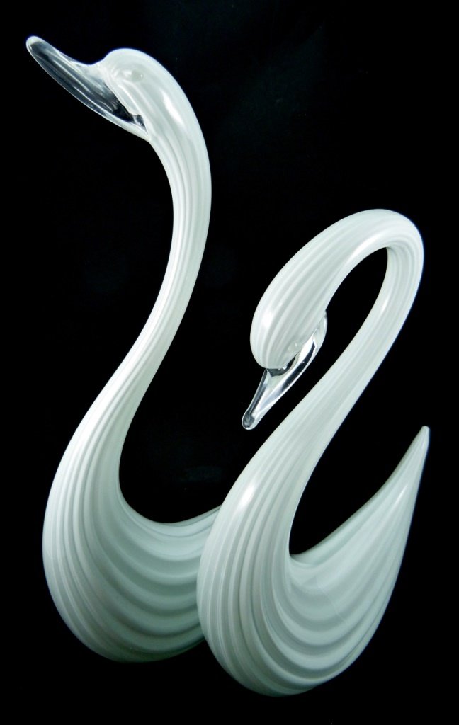 ELIO RAFFAELI SIGNED MURANO ART GLASS SWANS: Pair of Murano art glass hand blown swan sculptures, Signed by Italian artist Elio Raffaeli. Largest swan measures 17" (43cm) height by 9" (23cm) width, total weight 6450g.