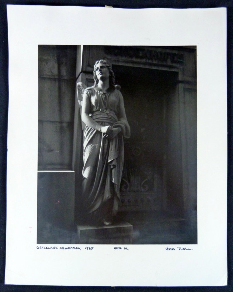 BOB THALL 1975 GRACELAND CEMETERY PHOTOGRAPH: Photograph by Bob Thall of the famous Graceland Cemetery. This photo was taken in 1975 and signed and titled by artist in black marker pen. Measures 14" (36cm) height by 11" (28cm) width.