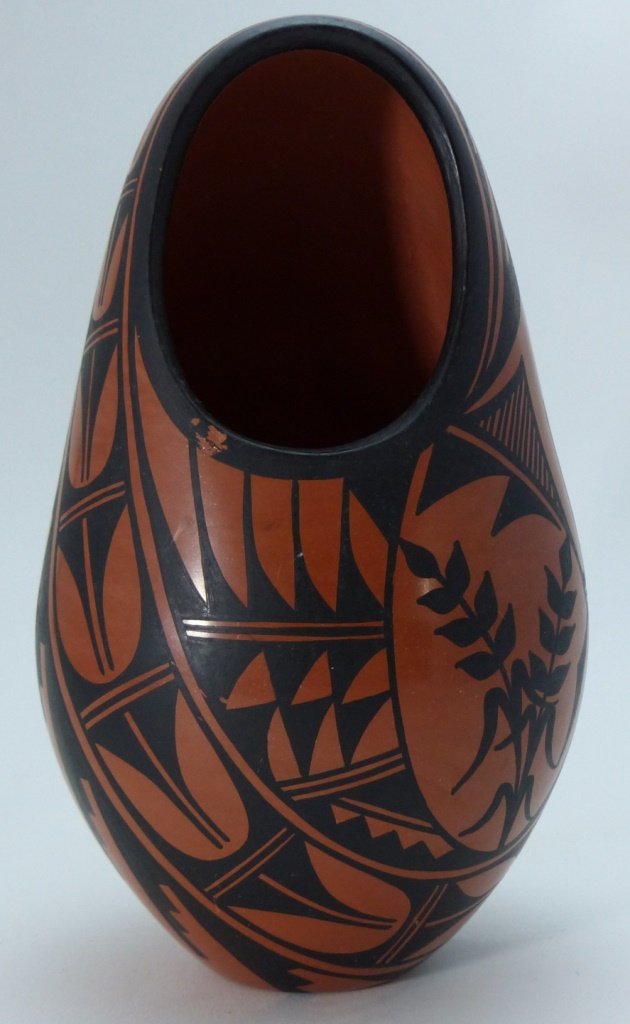 G. SANDIA JEMEZ NATIVE AMERICAN POTTERY: 1980's signed by G.Sandia Jemez Native American polychrome terracotta pottery. Signed to bottom. Measures 7 3/4" (19cm) height, total weight 341g.