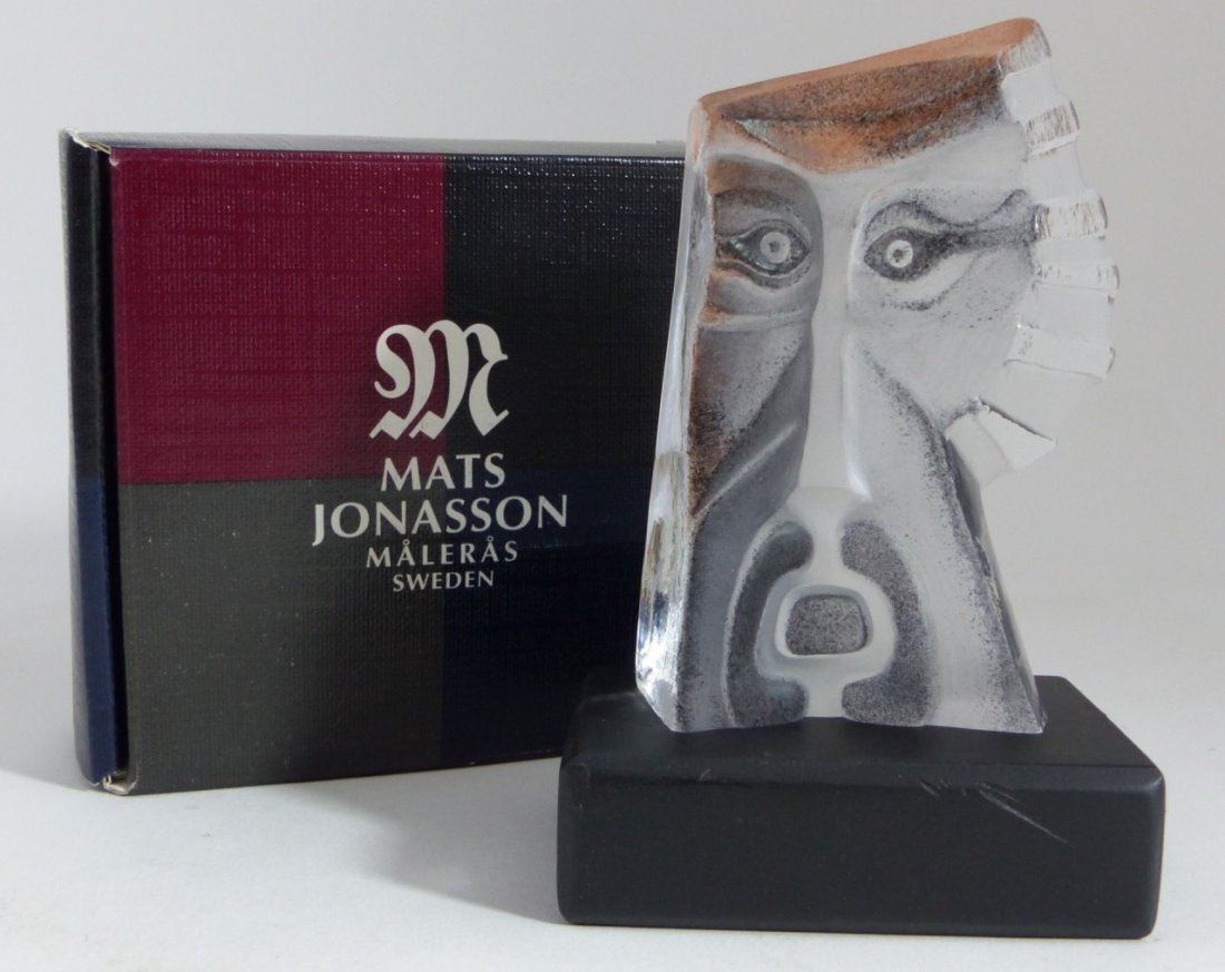 MATS JONASSON SWEDEN CRYSTAL SHAMA FIGURINE: Mats Jonasson (Sweden, 1945-) Art Glass Sculpture of "SHAMA" (Scandinavian Mythology), Signed on bottom w/label and Stand. New in Box. Measures 3" (7.62cm). Total weight 202.5 grams.