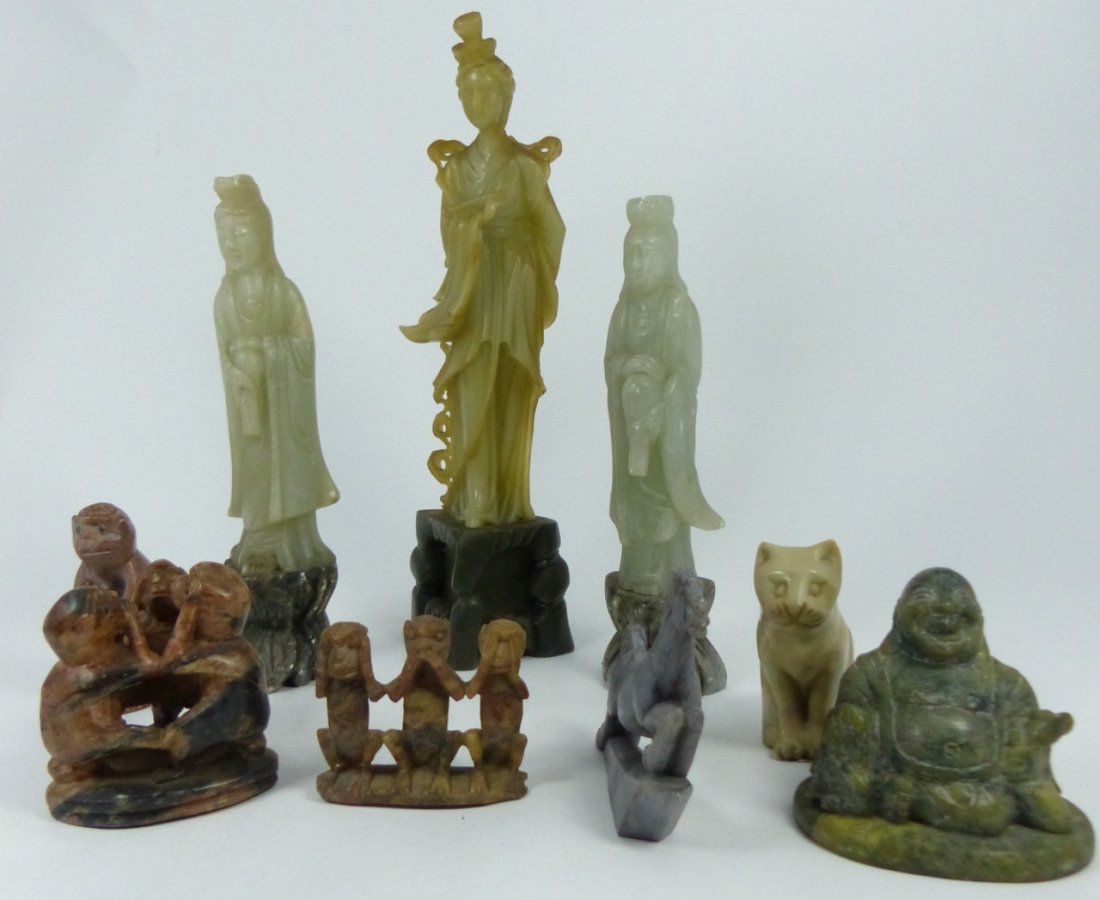 9pc CHINESE SOAPSTONE CARVINGS: 9 pieces Chinese soapstone carvings including Quan Yin, Buddha, Tang horse, and monkeys. Largest measures approx 10" (25cm).