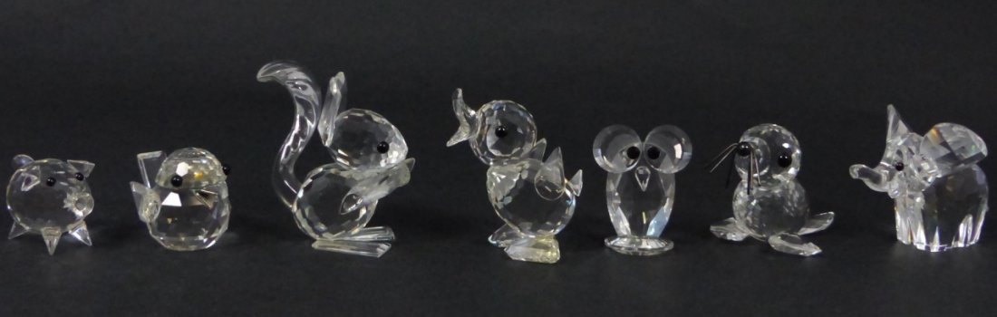 7pc SWAROVSKI AUSTRIAN CRYSTAL ANIMAL FIGURINES: 7 pieces Swarovski Austrian crystal animal figurines including squirrel, elephant, seal, pig, owl and 2 chicks. Largest (squirrel) measures 1 3/4" (4.5cm) height.