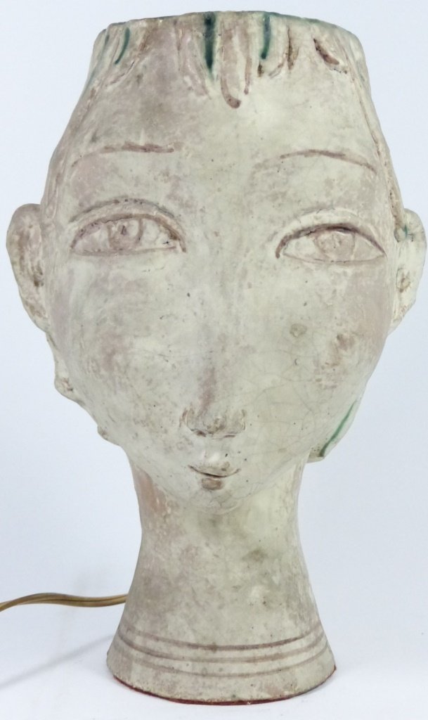MID CENTURY MODERN CERAMIC FACE LAMP: Mid century modern ceramic face lamp. Circa 60's or 70s. Measures 11" (28cm) height.