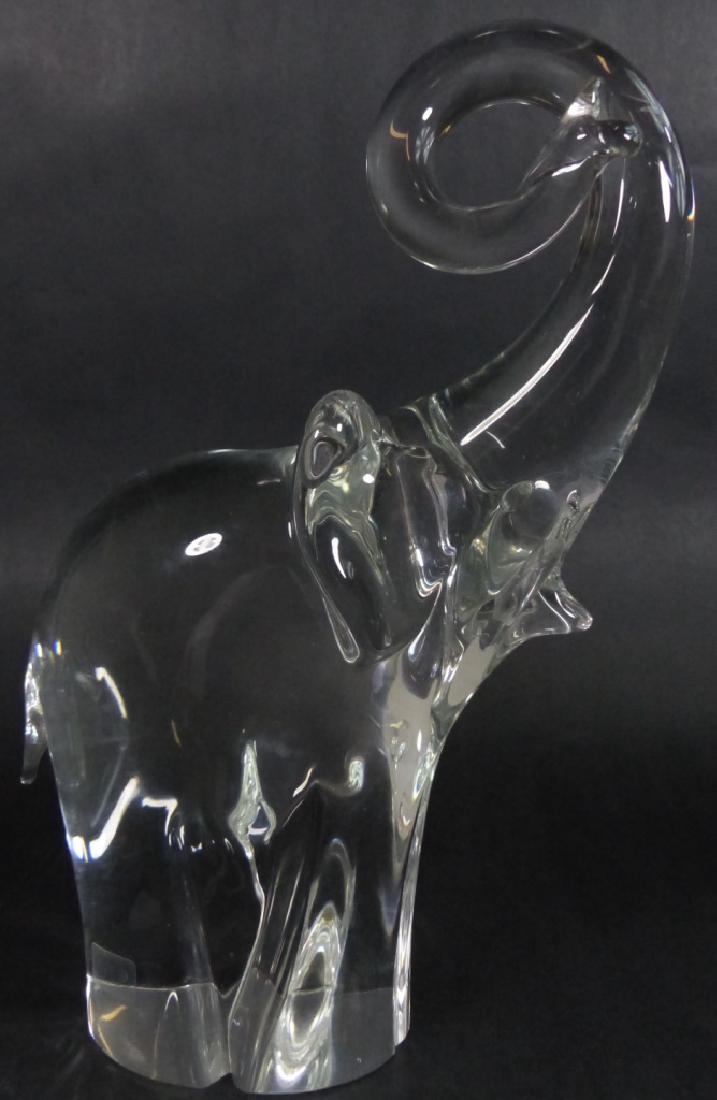 OGGETTI MURANO ART GLASS ELEPHANT SCULPTURE: Oggetti Murano art glass sculpture depicting an elephant with curled trunk. Measures 11" (28cm) height. Signed to bottom.