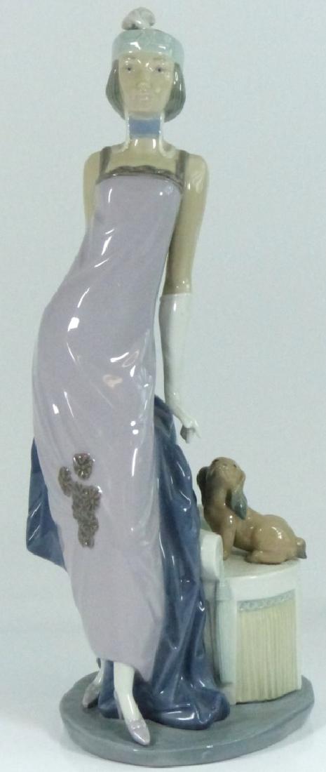 LLADRO 'COUPLET LADY' #5174 PORCELAIN FIGURE: Lladro porcelain figurine #5174 'Couplet Lady' depicting a flapper girl with dog to her side. Marked to bottom. Measures 13" (33cm) height.
