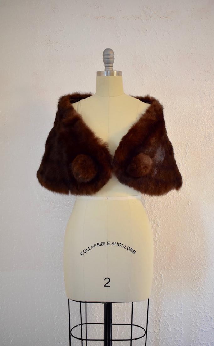 Vintage Faux Fur Cape: This item above is a "Vintage Faux Fur Cape. Excellent condition with minor wear and tear. Lining on the inside. One size fits all