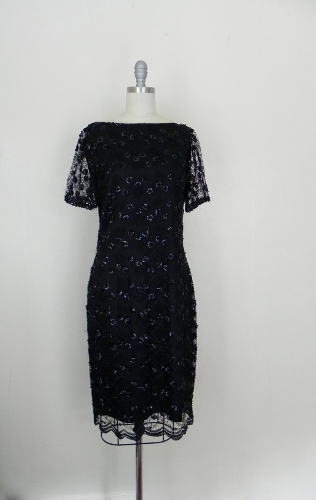 Vintage 1980s Black Sequined Floral Dress: This item above is a "Vintage 1980s Black Sequined Floral Dress. This item is in excellent vintage condition with minor wear. Beautiful sequined designs throughout the dress. Zipper in the back for cl
