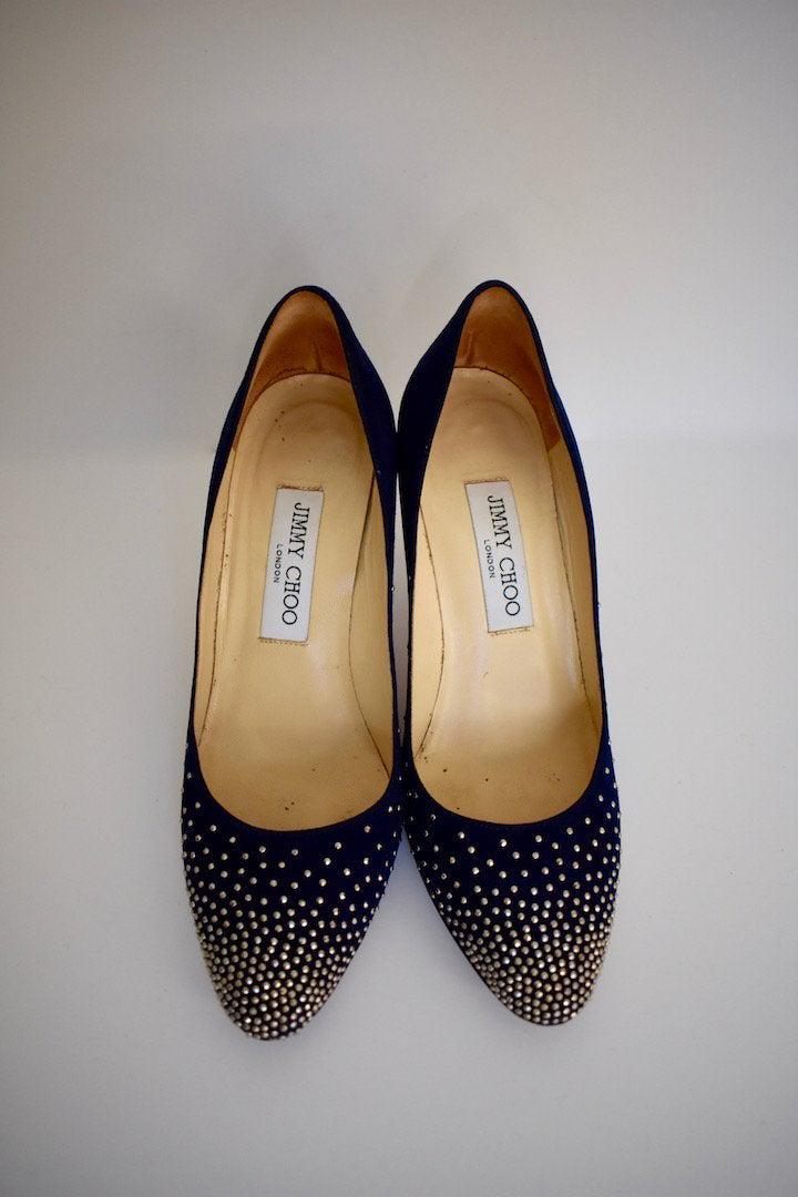 Jimmy Choo Blue Suede Silver Studded Confetti Pumps: This item above is a pair of Jimmy Choo Blue Suede Silver Studded Confetti Pumps Shoes. Great condition with some wear on bottom of shoe. Suede Material with studs throughout the toe of the shoe. Size