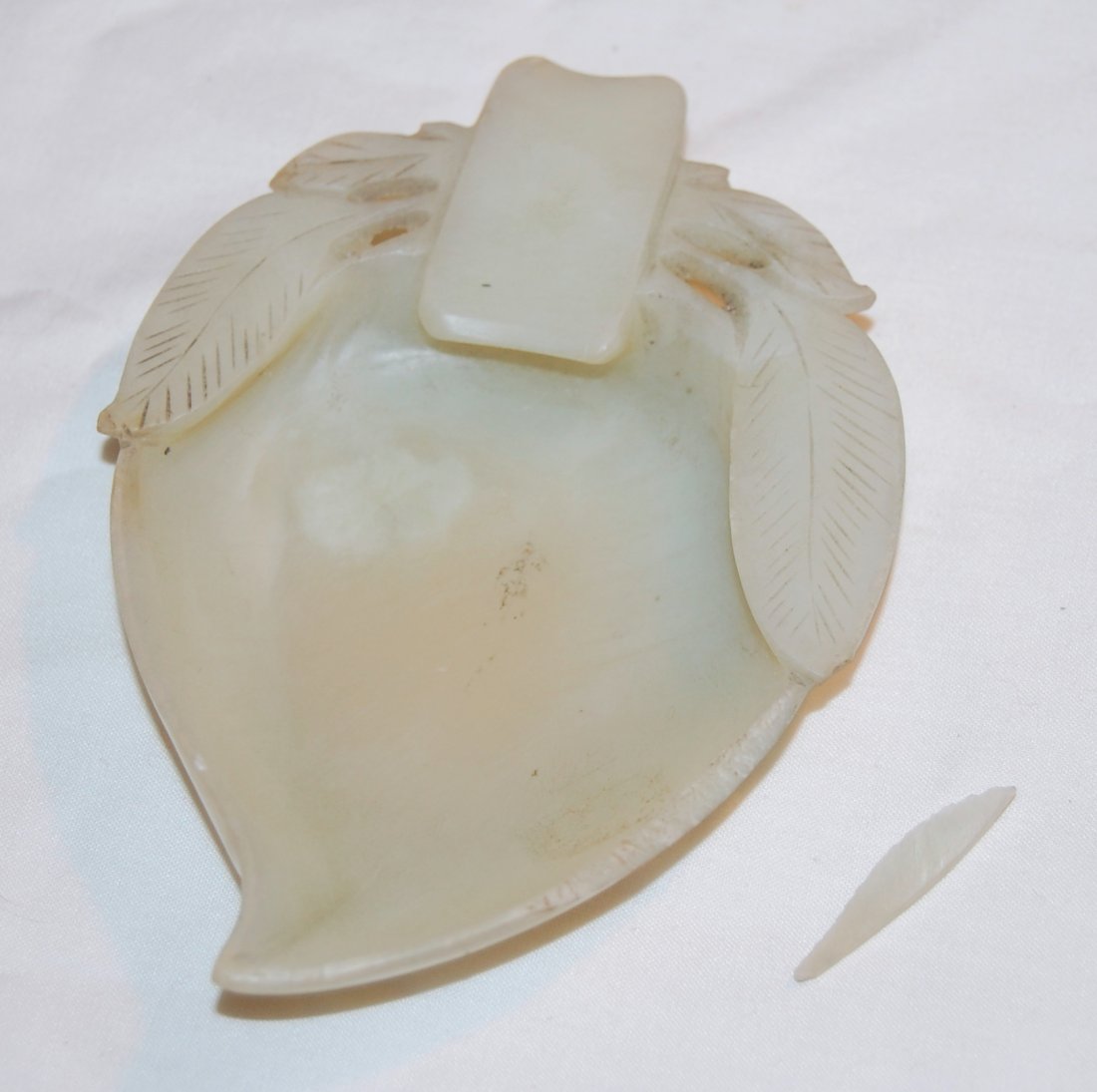Chinese White Jade Coupe Brush Washer: 4.25 x 3 inches (10.8 x 7.6 cm) Chip on right side about 3.1 cm long by about 4 mm deep, slight chip on back of leaf right side. Barely visible inscribed in back appears to be an inventory number.The 