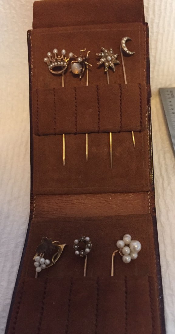 7 Gold & Pearl Stickpins in Mark Cross Case: All tops are 14kt or 10kt gold, two stems are not gold. 8 grams total weight.