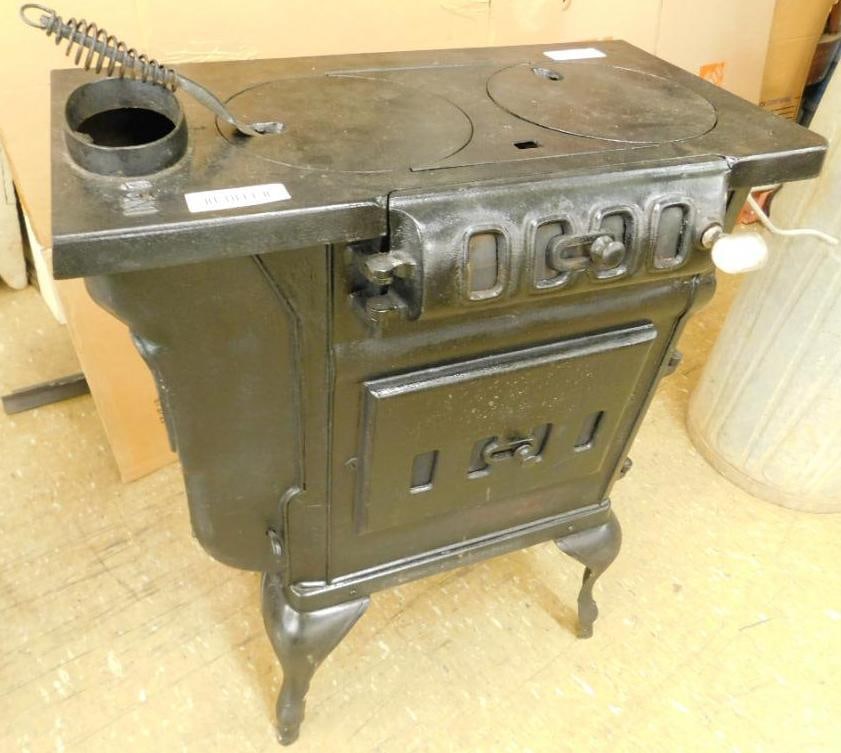 Wood Burning Cast Metal Stove: 35" x 25.5" x 16"