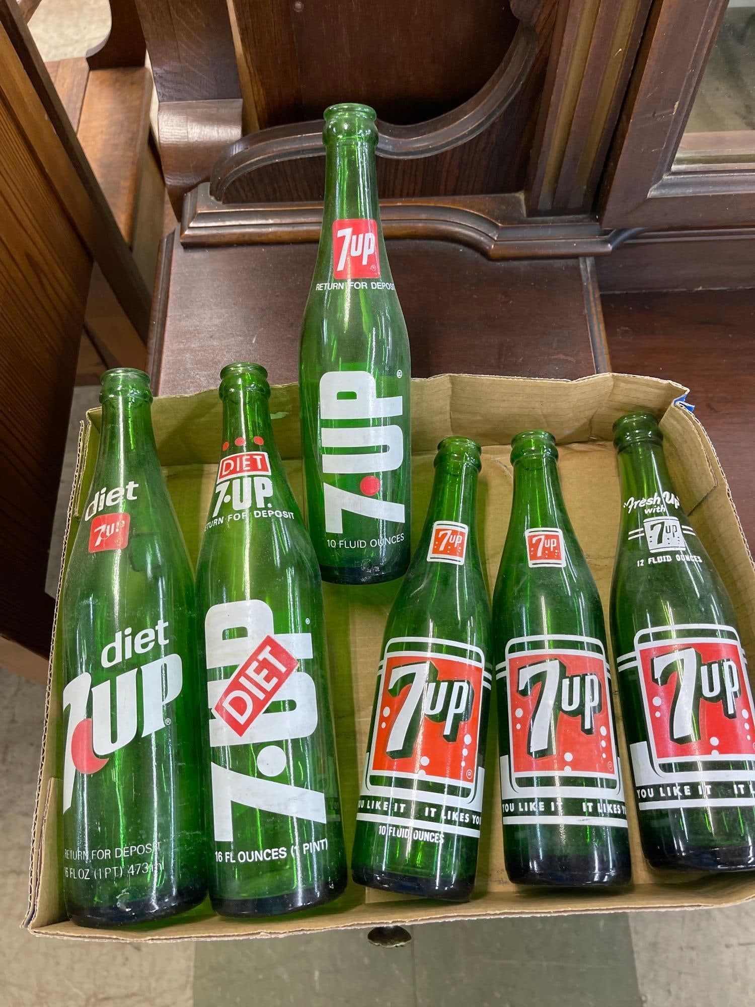 6 7-Up Bottles