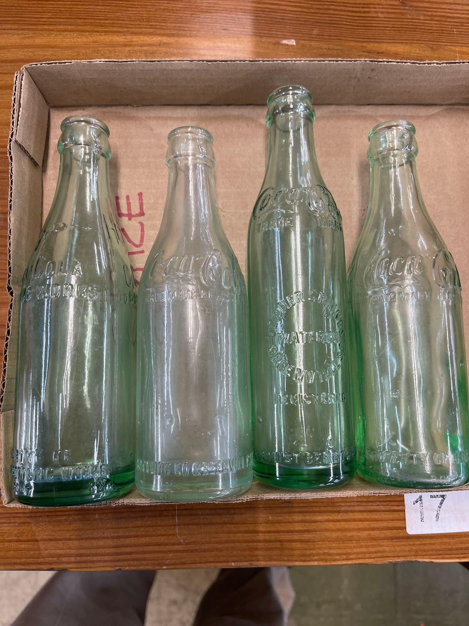 4 Coca Cola Bottles: 4 Coca Cola Bottles