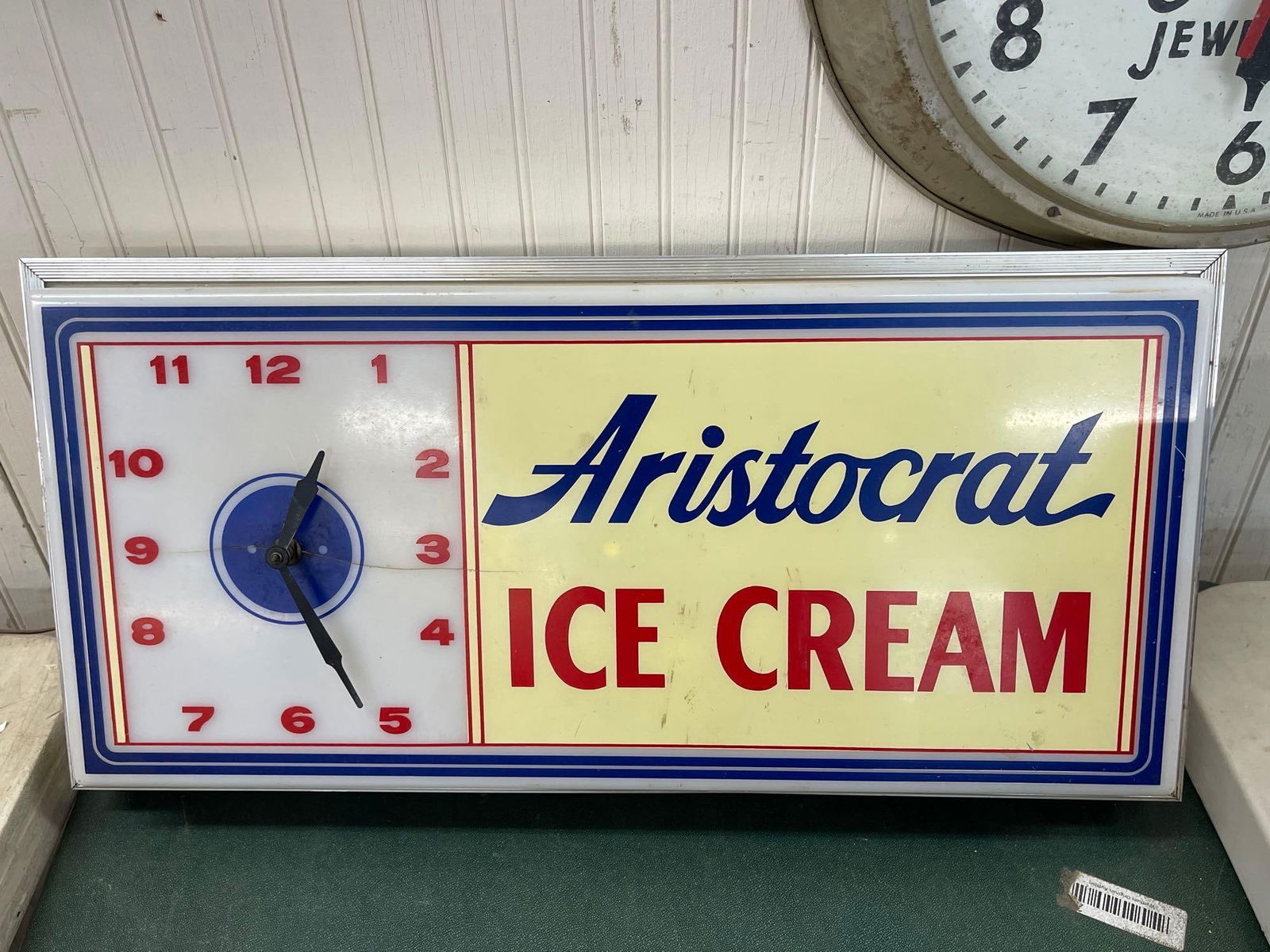 Aristocrat Wall Clock: Crack in plastic 25 X 12 