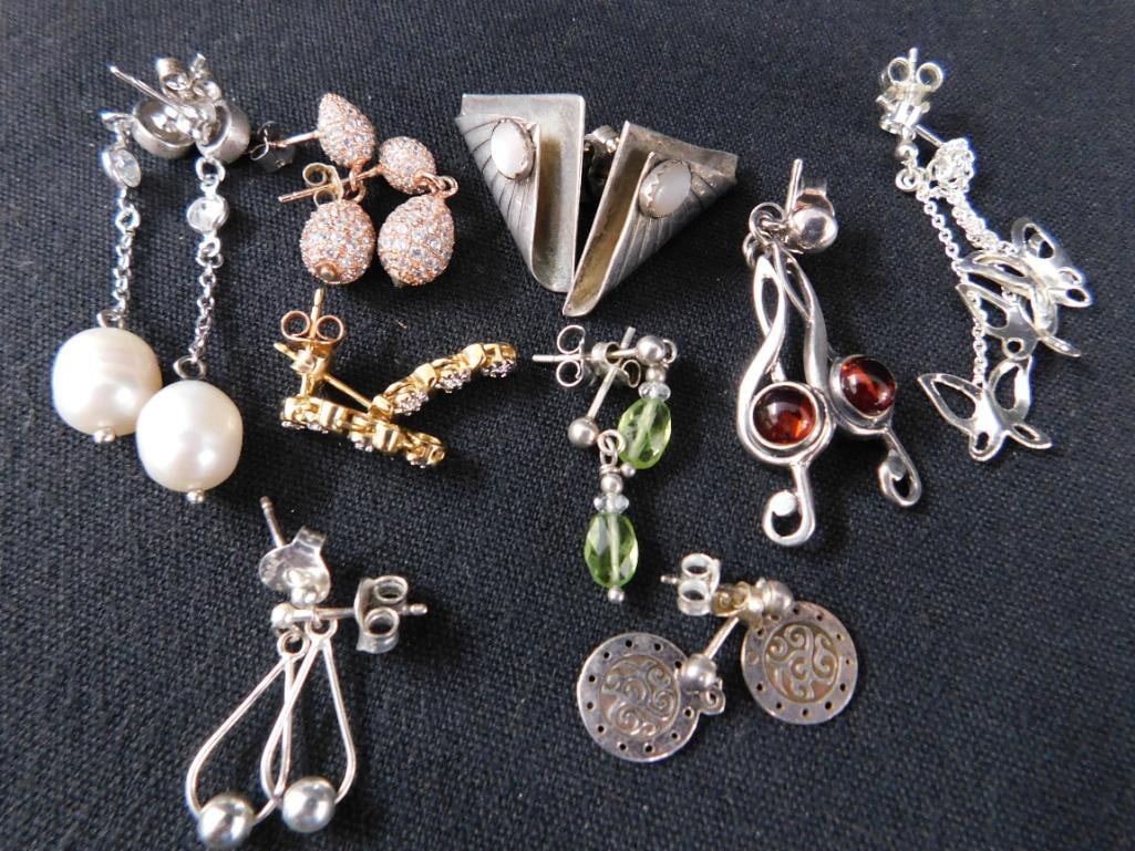 Sterling Silver - 9 Pairs of Pierced Earrings - 25.40 Grams TW - 10