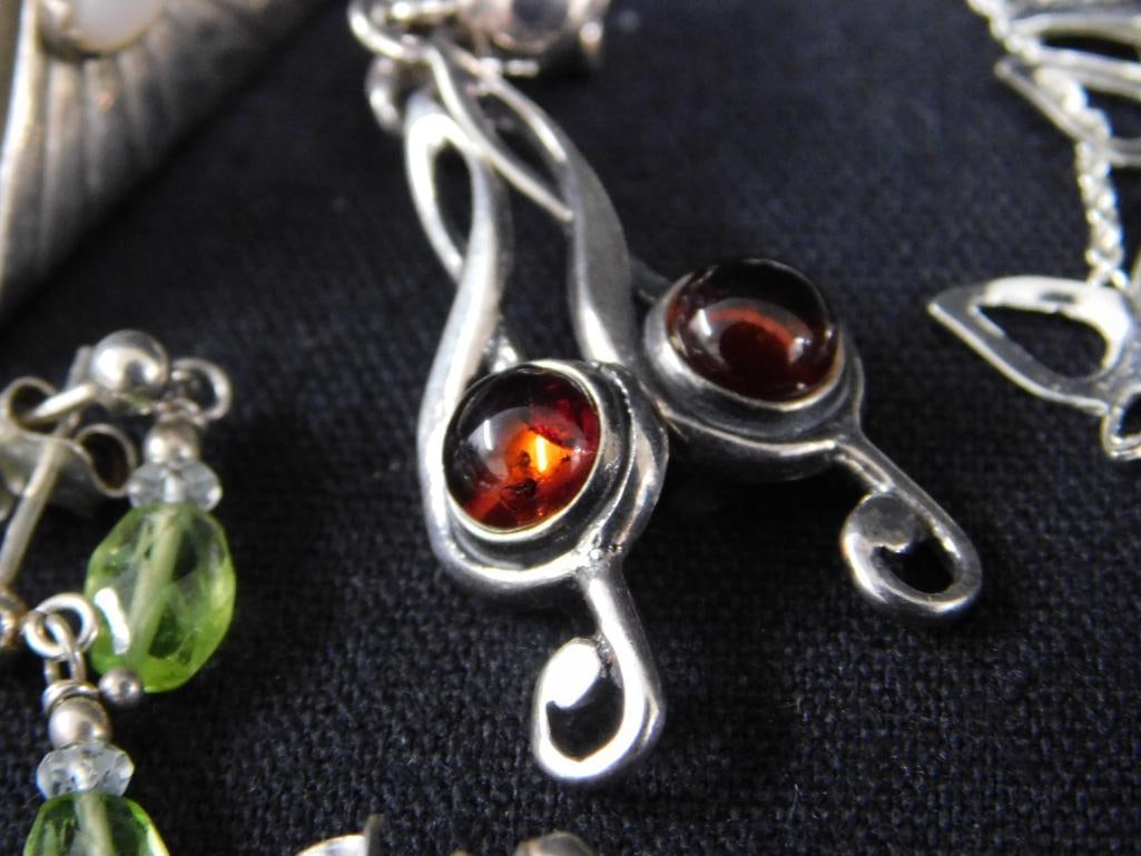 Sterling Silver - 9 Pairs of Pierced Earrings - 25.40 Grams TW - 5